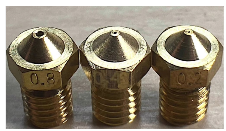 A wider nozzle can fix layer delamination because there's more to stick to!