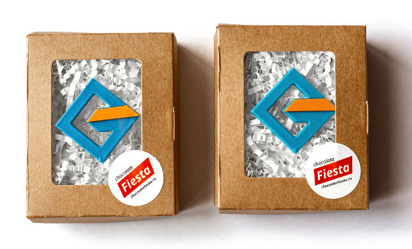Эволюция двухцветного логотипа из шоколадной глазури компании НПФ «Геофизика»